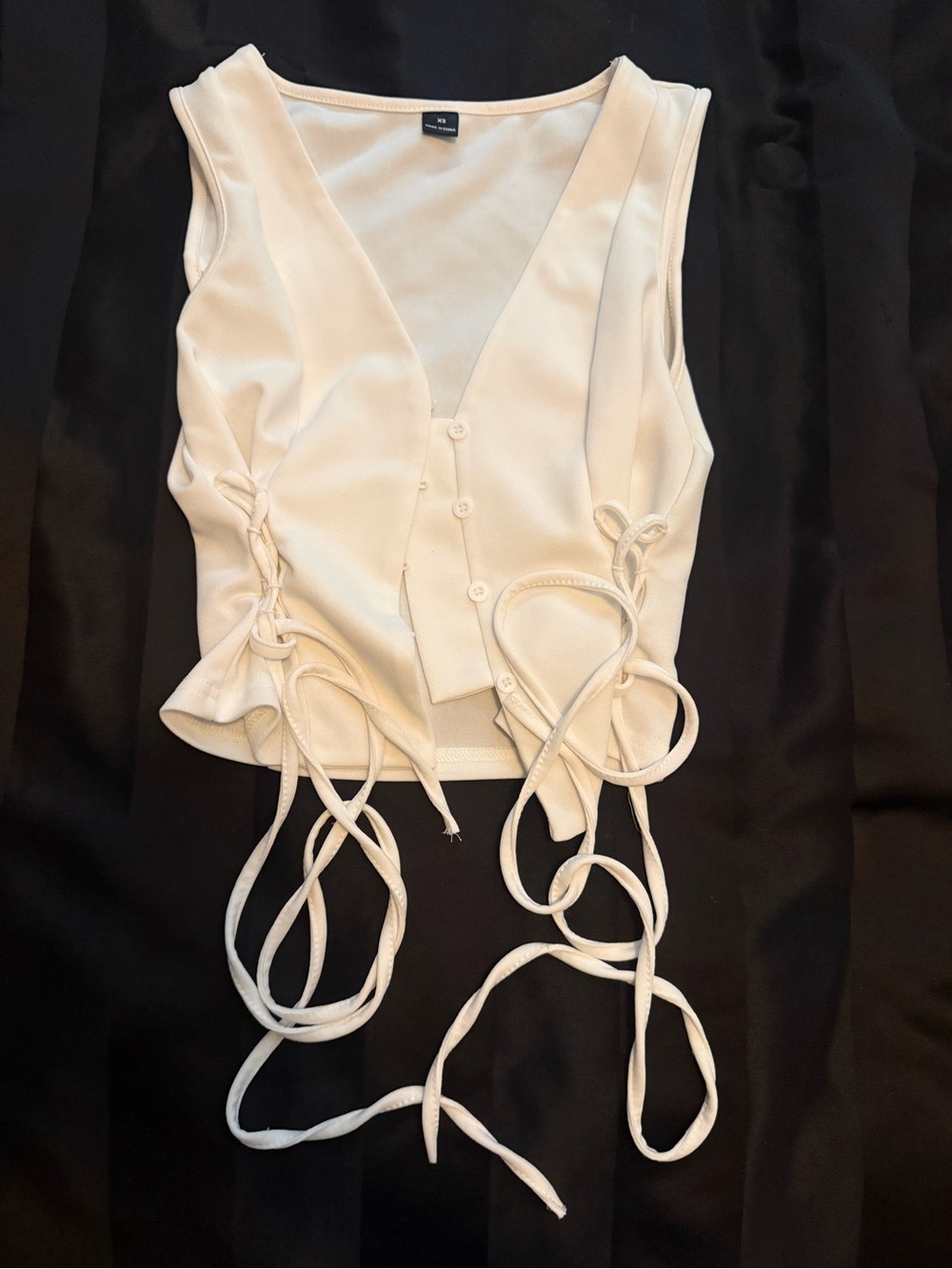 White vest top